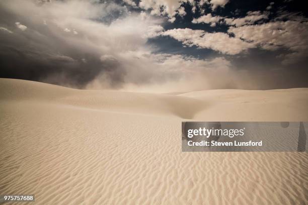 sandstorm, white sands national monument, alamogordo, new mexico, usa - sand blowing stock pictures, royalty-free photos & images