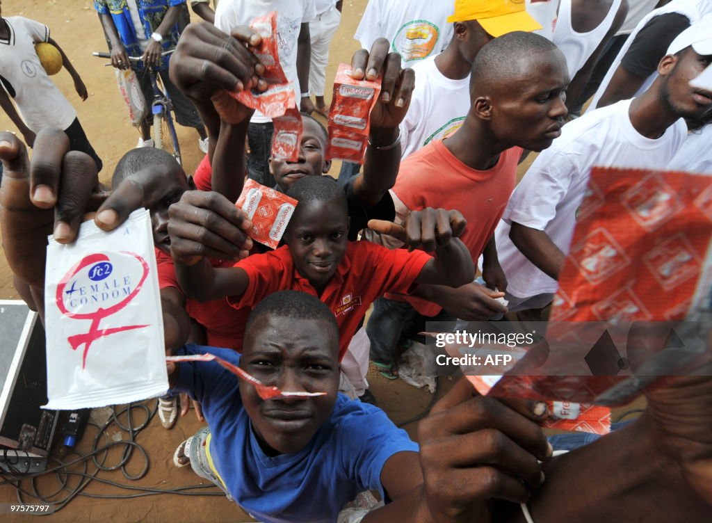 Youngsters brandish condoms, they receiv