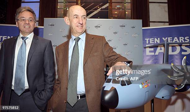 Louis Gallois from France and and CFO Hans-Peter Ring pose before the EADS annual results press conference on March 9, 2010 in Paris. European...