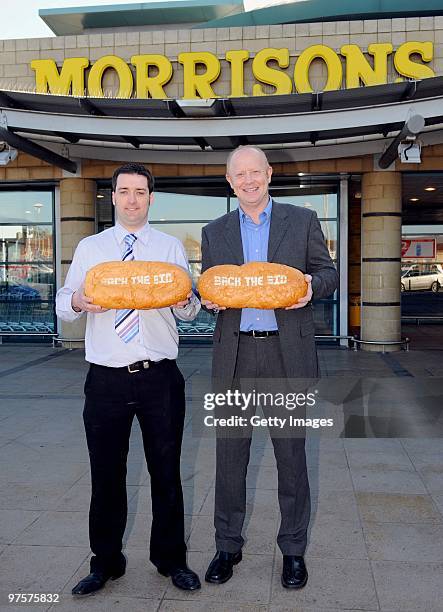Former England footballer Mark Wright and Jason Nicholson, deputy store manager, pose during a photo call to promote Morrisons as a sponsor of the...