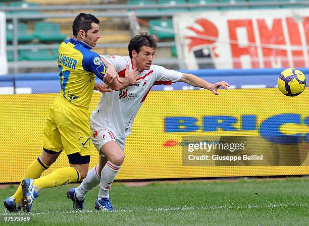 Sergio Pellissier of Chievo and Nicola Belmonte of Bari in action during the Serie A match between AS Bari and AC Chievo Verona at Stadio San Nicola...