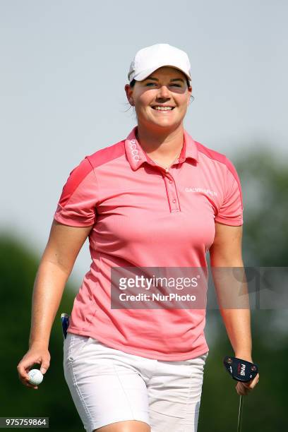 Caroline Masson of Gladbeck, Germany reacts after finishing the 17th hole during the second round of the Meijer LPGA Classic golf tournament at...