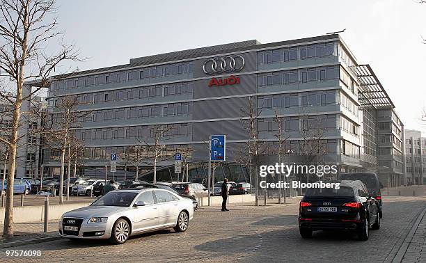 Traffic passes the Audi AG headquarters in Ingolstadt, Germany, on Tuesday, March 9, 2010. Volkswagen AG's Audi luxury division said profit fell 39...