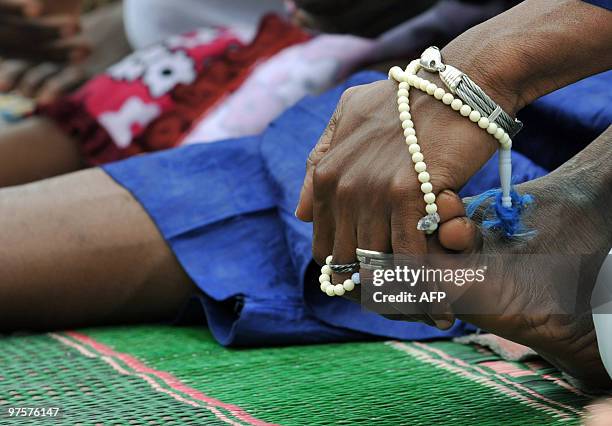 Hand of a Muslim man is pictured after a prayer on September 20, 2009 in Abidjan. Muslims worldwide celebrate Eid al-Fitr marking the end of the holy...