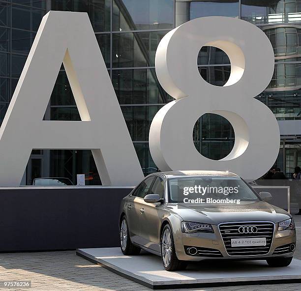 An Audi 8 automobile sits on display during the company's full year earnings press conference in Ingolstadt, Germany, on Tuesday, March 9, 2010....