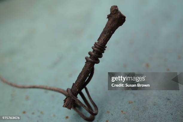 clutched - latch hook stock pictures, royalty-free photos & images
