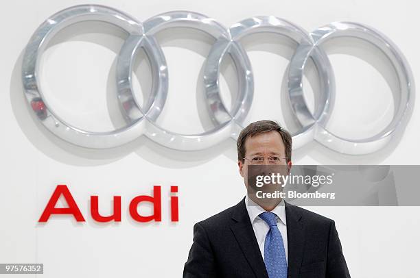 Axel Strotbek, chief financial officer of Audi AG, poses for photographers ahead of the company's full year earnings press conference in Ingolstadt,...