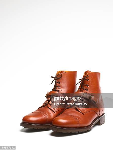 fashion brown boots on white background - leather shoe stock pictures, royalty-free photos & images