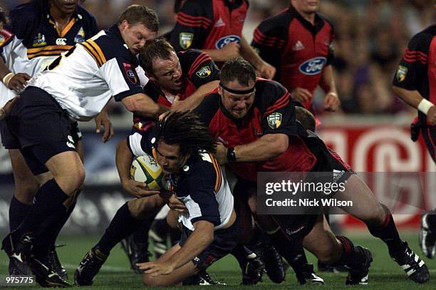 George Smith of the Brumbies breaks through the Crusaders defence during the 1st Round Super 12 match Between the ACT Brumbies and the Canterbury...