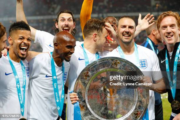 Jeremy Lynch, Blake Harrison, Sir Mo Farah, Olly Murs, Paddy McGuinness and Damian Lewis of England celebrate after winning the Soccer Aid for UNICEF...