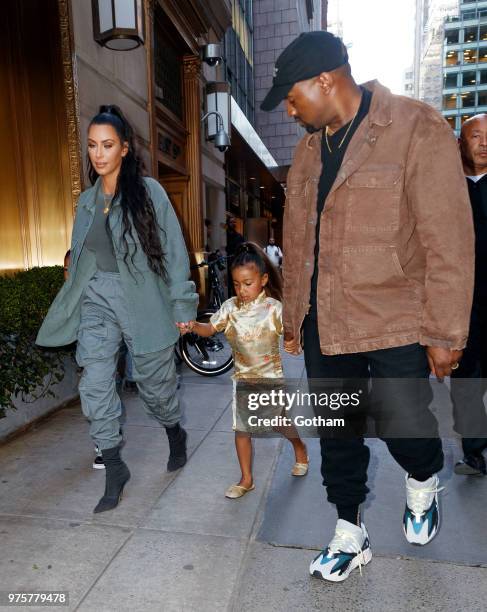 Kim Kardashian and Kanye West take North West to Polo Bar on June 15, 2018 in New York City.