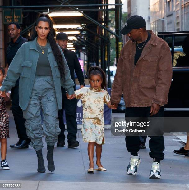 Kim Kardashian and Kanye West take North West to Polo Bar on June 15, 2018 in New York City.