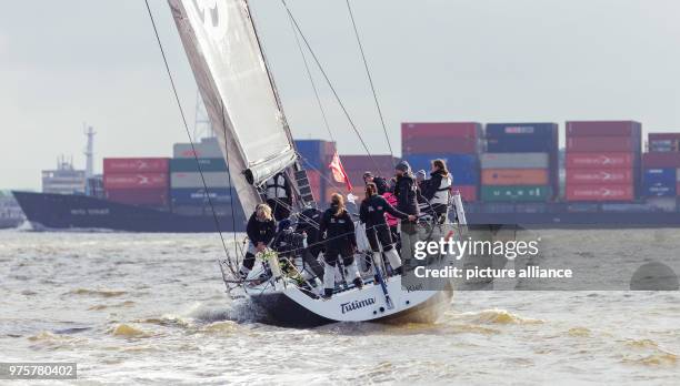 May 2018, Germany, Cuxhaven: Sailing crew of yacht 'Tutima', occupied with a female crew, are prepared on the estuary of the Elb river for the...