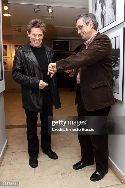 Willem Dafoe and Mario Sesti attend a sreening of "Viaggio nel Cinema Americano" at Casa del Cinema on March 8, 2010 in Rome, Italy.