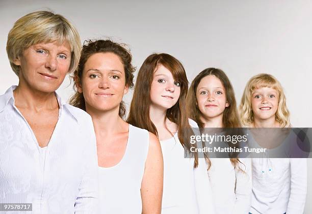 young family and grandparents - people in a row stock pictures, royalty-free photos & images