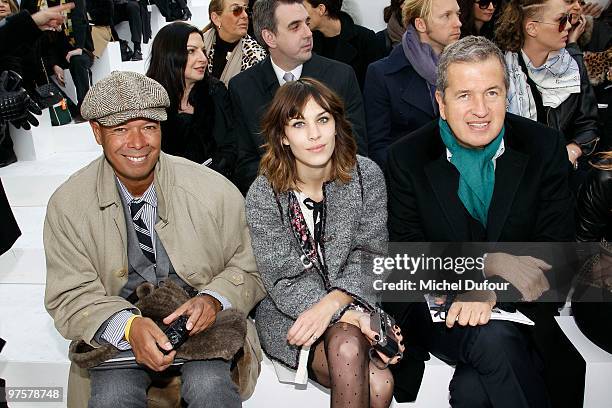 Alexa Chung and Mario Testino attend the Chanel Ready to Wear show as part of the Paris Womenswear Fashion Week Fall/Winter 2011 at Grand Palais on...