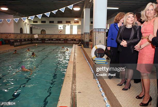 Dr. Jill Biden , wife of US vice President Joe Biden and Sara Netanyahu, wife of Israeli Prime Minister Benjamin Netanyahu visit the YMCA swimming...