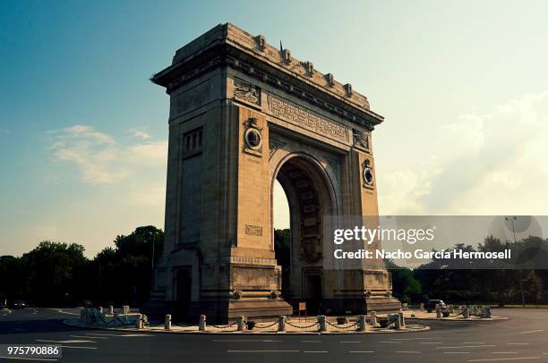 arch of triumph at bucarest - bucarest stock pictures, royalty-free photos & images