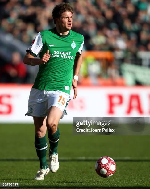 Sebastian Proedl of Bremen plays the ball during the Bundesliga match between Werder Bremen and VfB Stuttgart at Weser Stadium on March 6, 2010 in...