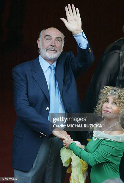 Scottish film veteran Sean Connery arrives with his wife Micheline Roquebrune 12 August 2003 at a Prague movie theatre for a special screening of his...