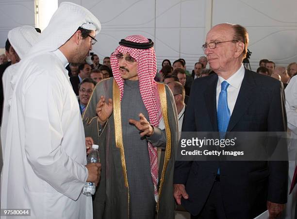 Media mogul Rupert Murdoch chats with Saudi billionaire Prince Al Waleed bin Talal and Mubadala Development Company CEO Khaldoon Al Mubarak at the...