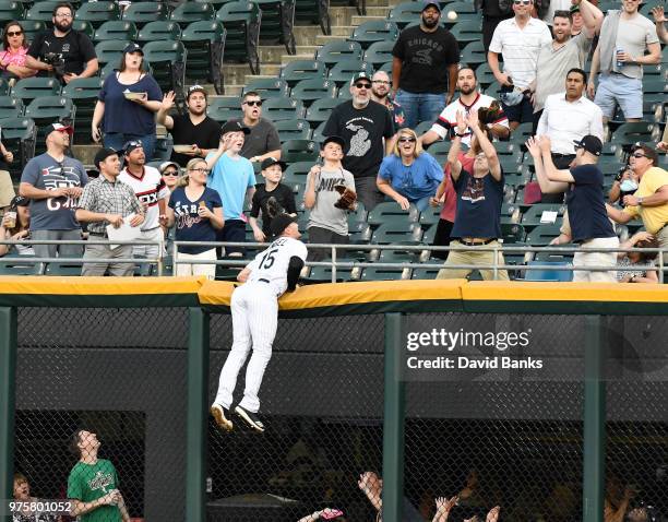 Adam Engel of the Chicago White Sox can't catch a home run hit by John Hicks of the Detroit Tigers during the second inning on June 15, 2018 at...