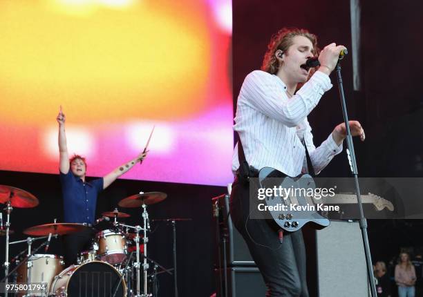 Ashton Irwin and Luke Hemmings of 5 Seconds of Summer performs onstage during 2018 BLI Summer Jam at Northwell Health at Jones Beach Theater on June...