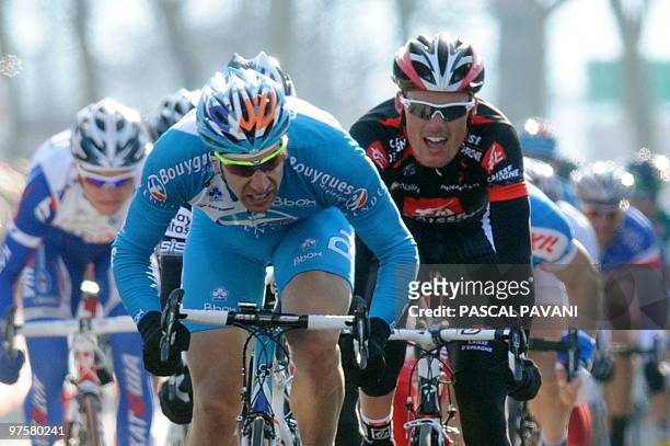 France's BBOX Bouygues Telecom cycling race's France's William Bonnet sprints on the finish line with Spanish cycling team Caisse d'Epargne, Spain's...