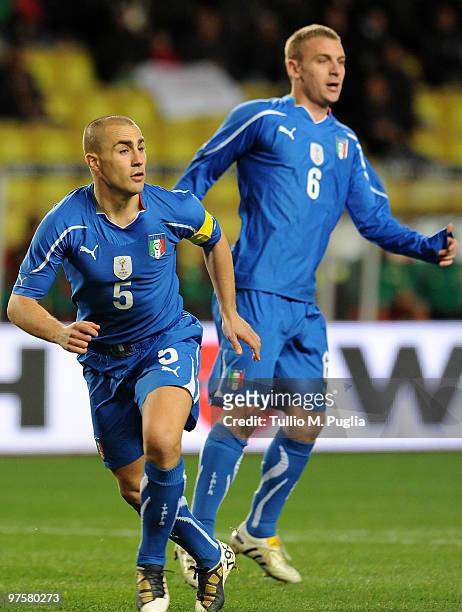 Fabio Cannavaro and Daniele De Rossi of Italy in action during the International Friendly match between Italy and Cameroon at Louis II Stadium on...