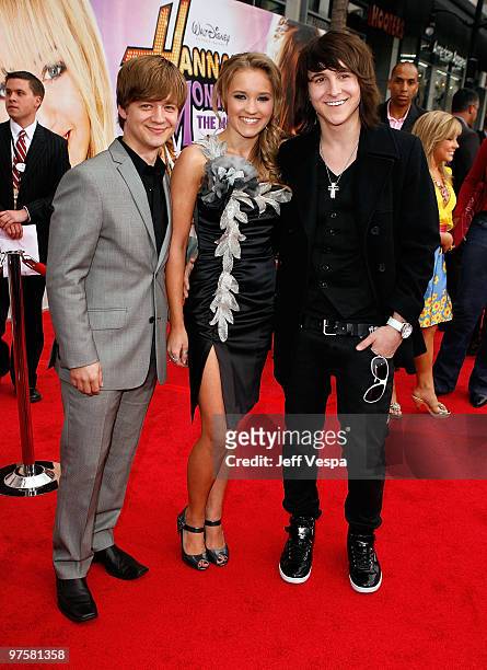 Actors Jason Earles, Emily Osment, and Mitchell Musso arrive at the premiere of Walt Disney Picture's "Hannah Montana: The Movie" held at the El...