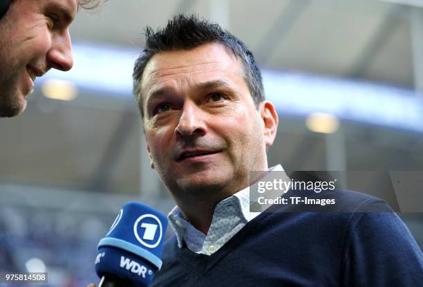 Christian Heidel of Schalke gives an interview prior to the Bundesliga match between FC Schalke 04 and Borussia Dortmund at Veltins-Arena on April...