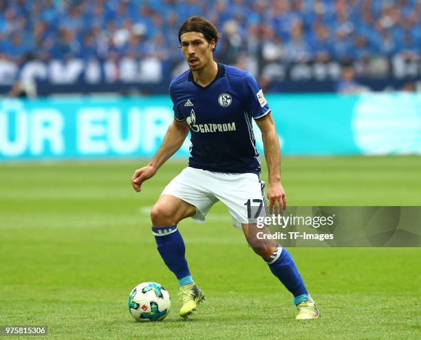 Benjamin Stambouli of Schalke controls the ball during the Bundesliga match between FC Schalke 04 and Borussia Dortmund at Veltins-Arena on April 15,...