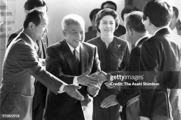 Prince Norodom Sihanouk and his wife Princess Norodom Monineath of Cambodia are welcomed on arrival at Narita Airport on August 8, 1988 in...