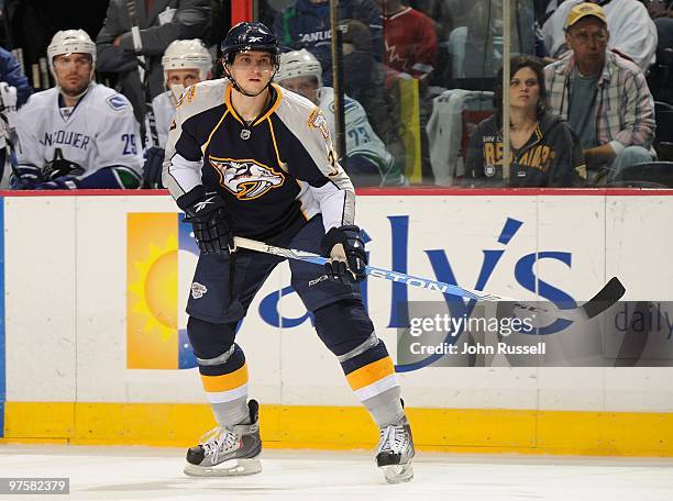 Denis Grebeshkov of the Nashville Predators skates against the Vancouver Canucks on March 7, 2010 at the Bridgestone Arena in Nashville, Tennessee.