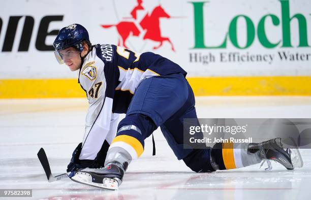 Denis Grebeshkov of the Nashville Predators skates against the Vancouver Canucks on March 7, 2010 at the Bridgestone Arena in Nashville, Tennessee.