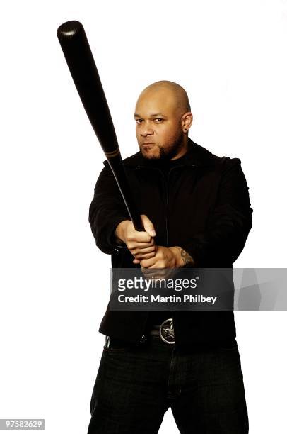 Howard Jones of Killswitch Engage poses for a portrait, holding a baseball bat, on 23rd October 2005 in Adelaide, Australia.