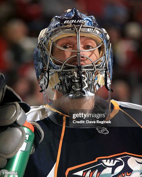 Close up of the mask of Dan Ellis of the Nashville Predators during an NHL game against the Detroit Red Wings at Joe Louis Arena on March 5, 2010 in...