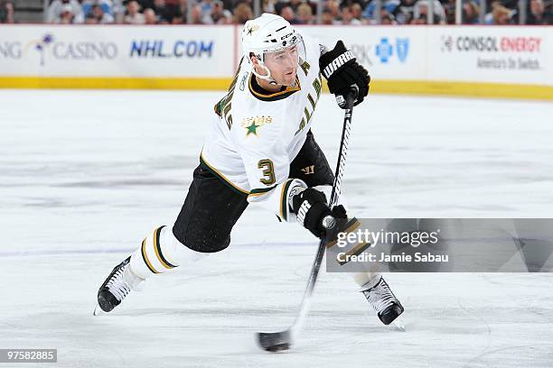 Defenseman Stephane Robidas of the Dallas Stars shoots the puck against the Pittsburgh Penguins on March 6, 2010 at Mellon Arena in Pittsburgh,...