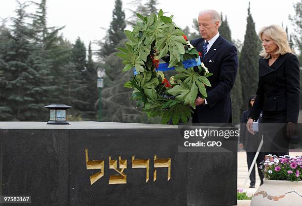 In this handout image from the Israeli Government Press Office, U.S. Vice President Joe Biden and his wife Dr. Jill Biden stand at the graves of late...