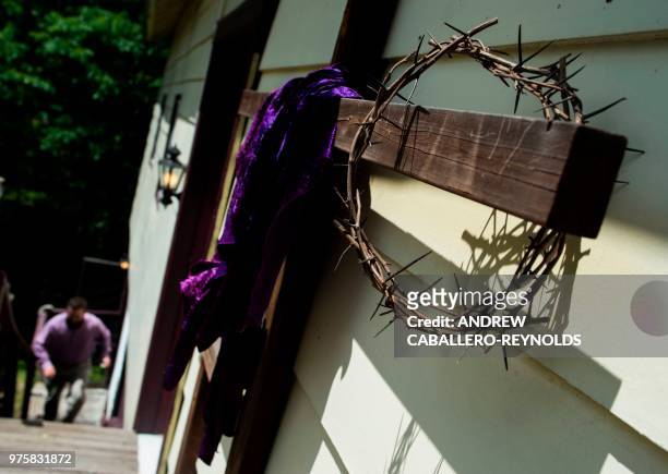 Crosses and a crown of thorns are seen before a Pentecostal serpent handlers service at the House of the Lord Jesus church in Squire, West Virginia...