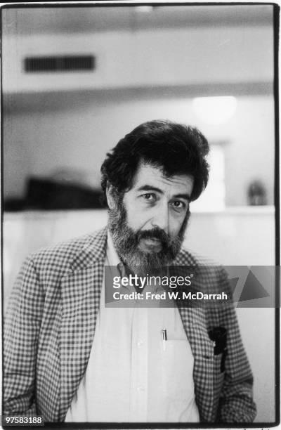 Portrait of American journalist and music critic Nat Hentoff inside the offices of the Village Voice newspaper, New York, New York, October 3, 1975.
