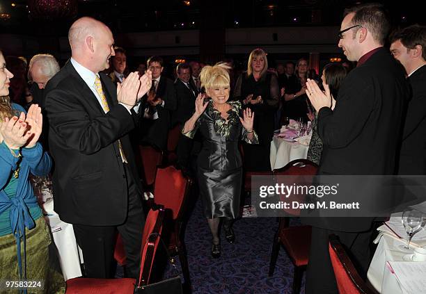 Actress Barbara Windsor is applauded as she goes up to accept her award at the 2010 TRIC Awards at the Grovesnor House Hotel March 09, 2010 in...