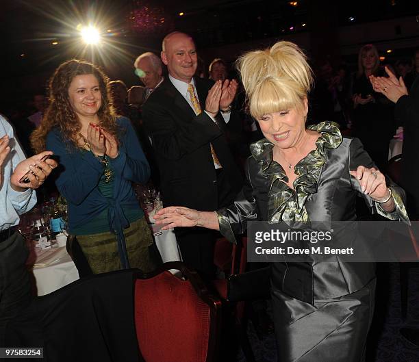 Actress Barbara Windsor is applauded as she goes up to accept her award at the 2010 TRIC Awards at the Grovesnor House Hotel March 09, 2010 in...