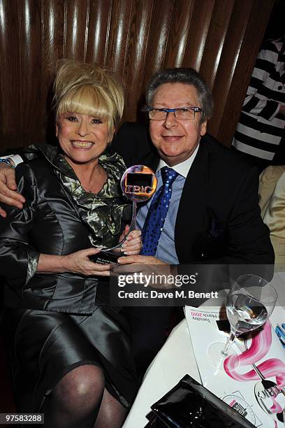 Actress Barbara Windsor poses with her award at the 2010 TRIC Awards at the Grovesnor House Hotel March 09, 2010 in London, England.