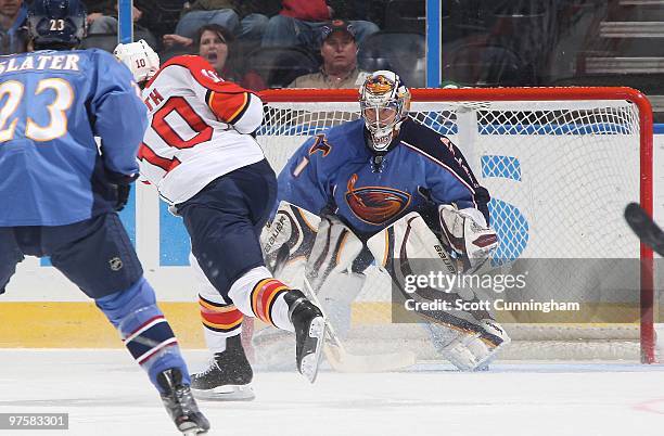 David Booth of the Florida Panthers fires a shot to score against Johan Hedberg of the Atlanta Thrashers at Philips Arena on March 2, 2010 in...
