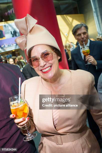 May 2018, Germany, Berlin: Fiona Bennett, German-British milliner, attends a celebration and live broadcast of the royal wedding of Prince Harry and...