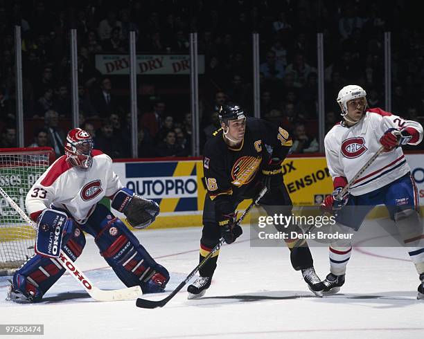 Trevor Linden of the Vancouver Canucks skates against the Montreal Canadiens in the 1990's at the Montreal Forum in Montreal, Quebec, Canada.