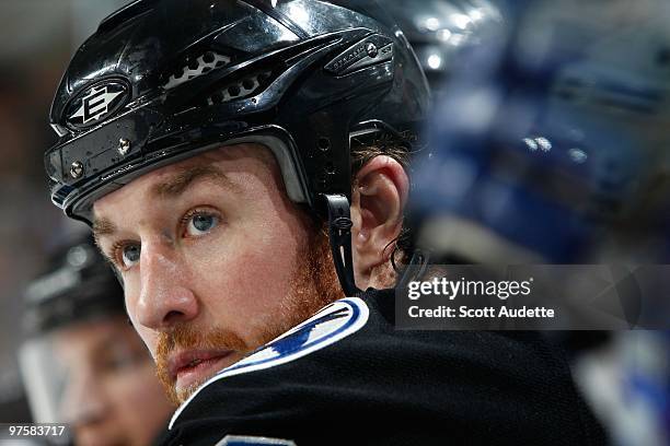 Ryan Malone of the Tampa Bay Lightning watches the game from the bench between shifts during the game against the Philadelphia Flyers at the St. Pete...