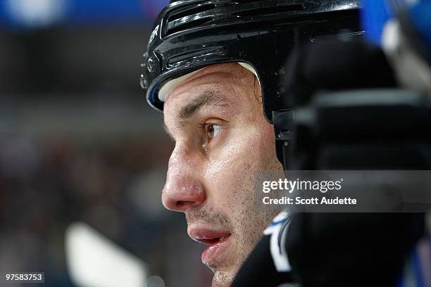 Zenon Konopka of the Tampa Bay Lightning rest on the bench between shifts against the Philadelphia Flyers at the St. Pete Times Forum on March 2,...