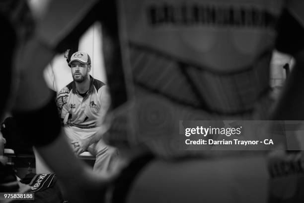 Dan Christian of the Australian Indigenous Men's cricket team speaks to his team before the match against the MCC at Arundel cricket ground on June...